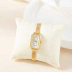 Teresa – Orologio in oro con quadrante rettangolare.