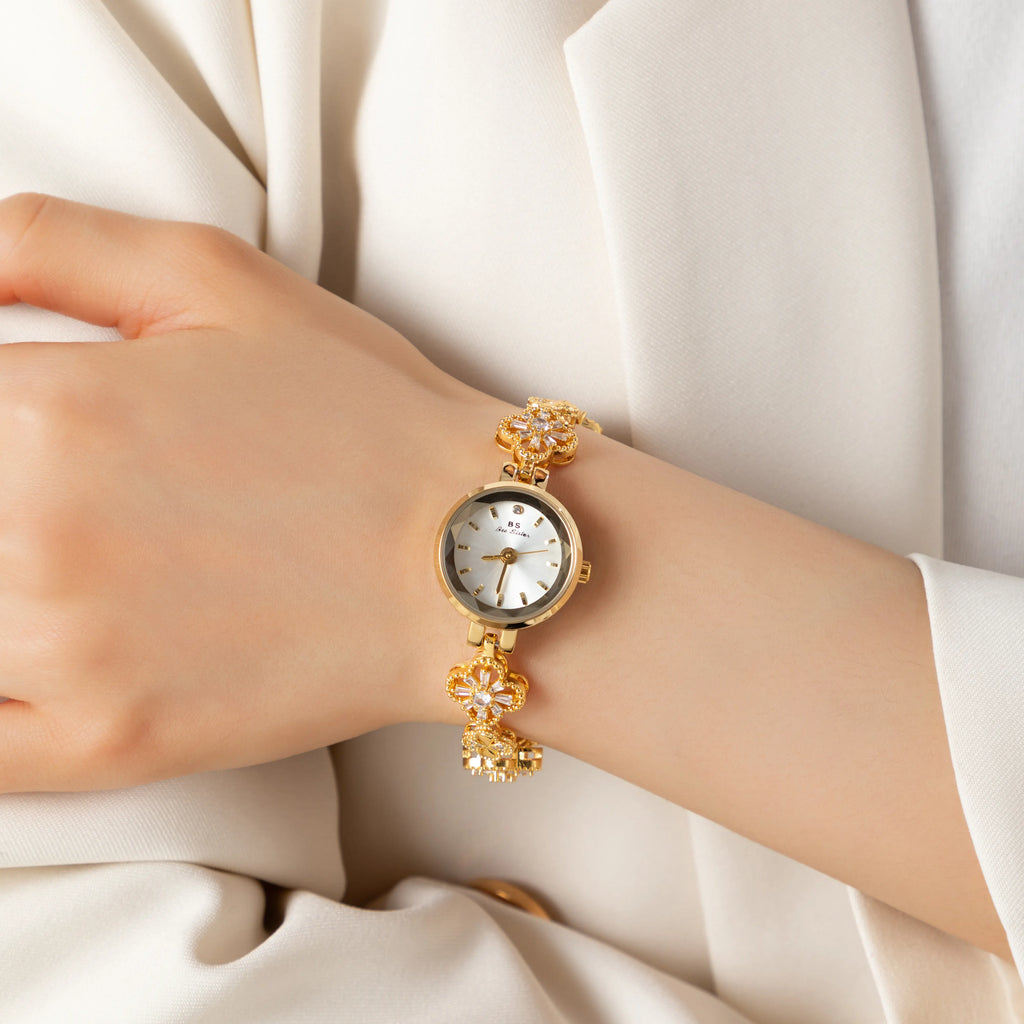 Elina – Orologio in oro con bracciale a fiori.