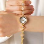 Elina – Orologio in oro con bracciale a fiori.