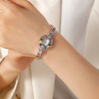 Amélie – Orologio in oro con montatura in cristallo.