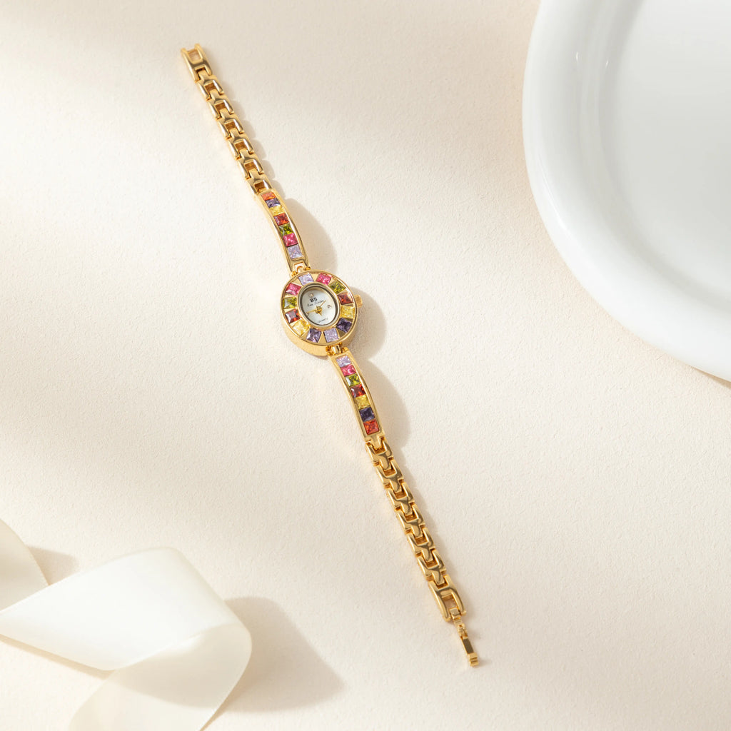 Amélie – Orologio in oro con montatura in cristallo.